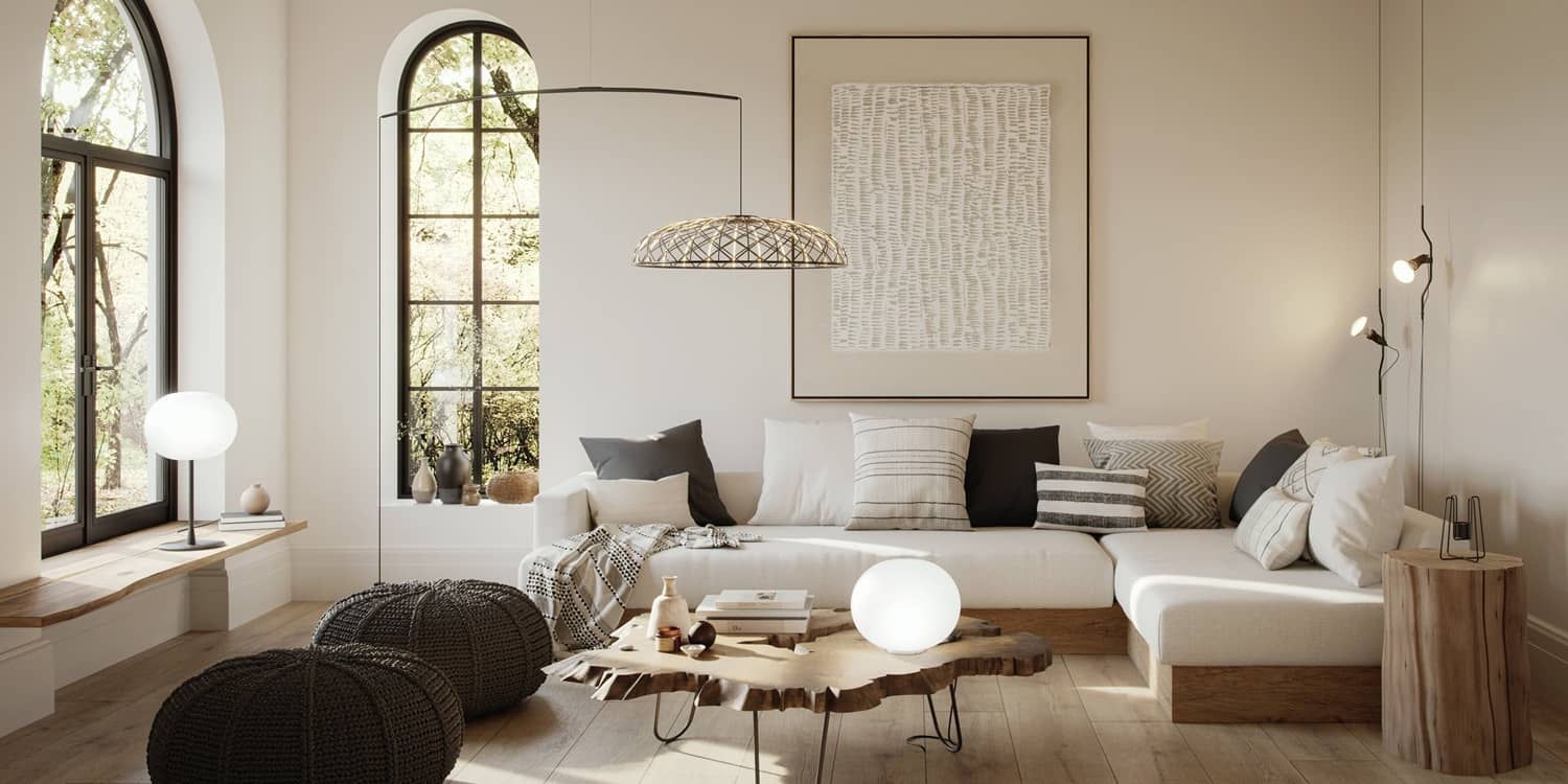 Ein stimmig und nat&uuml;rlich eingerichtetes Wohnzimmer mit viel Holz und mehreren direkten und indirekten Lichtquellen